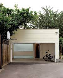 Architect Visit Cary Bernstein Resurrects A Circa 1908 Garage Gardenista Sourcebook For Outdoor Living Garage Design Modern Playroom Garage Decor