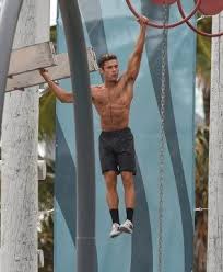 Baywatch starred dwayne johnson, alexandra daddario, and efron as an elite group of lifeguards. Shirtless Zac Efron Films Scenes For Baywatch Zac Efron Shirtless Zac Efron Zac