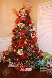 Our decorative ornament hooks are a wonderful way to beautifully and safely hang your old world christmas ornaments on your tree. Christmas Tree Decorated With Red And Gold Ornaments Stock Photo Picture And Royalty Free Image Image 10044256