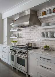 Well Appointed Light Gray And White Kitchen Boasts Stacked White Floating Shelves Mounted White Kitchen Kitchens Without Upper Cabinets Gray And White Kitchen