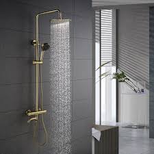 But before you rush to buy a new shower head and hire a handyman to do the installation, there are a few things you need to consider about rain shower heads. Brushed Gold Color Bathroom Thermostatic Control Shower Faucet Set Wall Mounted Round Design Rain Shower Head Brass Material Shower Faucets Aliexpress
