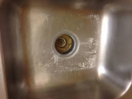 dirty kitchen sink upon arrival