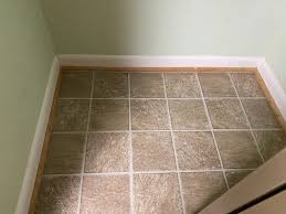 Old peel and stick flooring tiles that have been down for many years will always cause the issue you are having.the only true solution to removing all of the sticky residue and goo. Peel And Stick Floor Tile Love Remodeled