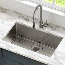 One side of the sink (typically the side facing the kitchen) is flattened and the opposite side (where the faucet sits) is rounded. Kraus 30 Kitchen Sink Combo Costco