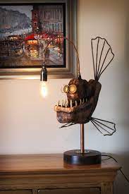 Flexible lamp head for adjustments. Nik Burns Sculptor Angler Fish Lamps