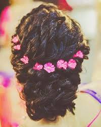 Medium length hair can be styled into a loose curly updo with neatly tucked edges. 40 Indian Bridal Hairstyles Perfect For Your Wedding