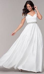 Why not make a bold statement in a vibrant red long ball gown? Promgirl White Prom Dresses Formal White Gowns