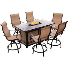 Fire pit tables have gained popularity as more people are bringing indoor living spaces to the outdoors. Agio Somerset 7 Piece Rectangular Outdoor Bar Height Dining Set With Fire Feature And Swivels Somdn7pcfp Bar The Home Depot