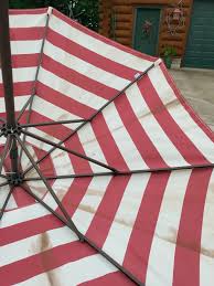 Place it on your balcony, in the front yard, or on your patio for a relaxing place to eat and have conversations; How To Clean Your Patio Umbrella White Arrows Home
