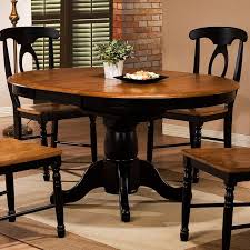 Quails Run 57 In Round Single Pedestal Dining Table With 15 In Butterfly Leaf Www Hayneedle Com Pedestal Dining Table Dining Table Makeover Dining Table