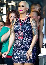 If you get to heaven, it will only be through the sacrifice of jesus christ upon the cross, where he gave his precious blood for you. Amber Rose Sports An Inverted Cross Design On Her Forehead As She Puffs Away On A Cigarette At A Music Festival Daily Mail Online