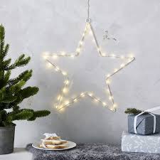 Pre Lit Hanging Star 40 Bulbs Christmas Room Decorations The White Company Star Christmas Lights Hanging Stars Decorating With Christmas Lights