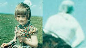 For over 50 years, many believed the entity behind the girl to be a  spaceman from an alien world until experts revealed it's probably the  girl's mother who was with her that