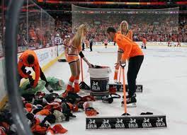 Flyers Ice Crew Has To Clean Up Hats That Were Thrown After Simmonds Hat Trick Beatnewyork Clutchtime Flyer Basketball Court Clean Up