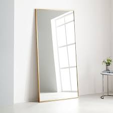 You can read more about how we do this with no extra cost to you. Metal Frame Oversized 78 Floor Mirror Antique Brass