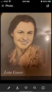 Can someone clean up this old family photo?