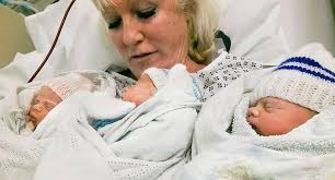 55 and pregnant with TRIPLETS!