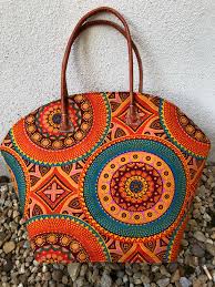 Transformez notre cabas en gros sac de voyage et rangez à l'intérieur tout ce dont vous avez besoin (vêtements, trousse de toilette, appareil photo Sacs Hautex Artisanat De Madagascar Vente En Gros Et Grossiste