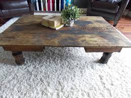 It measures 26 long x 20 wide x 22 high (pictured: A Primitive Table Turned Coffee Table The Curators Collection