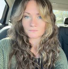 Looking for tattoo artist to cover up thin cursive writing