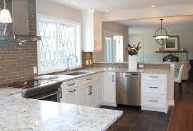 White ice granite, white subway tile with gray grout. The Beauty Of White Ice Granite