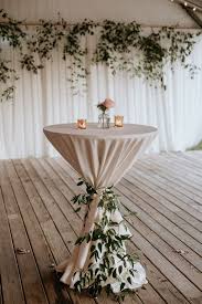 Create cocktail table centerpieces with one ingredient. A Boho Wedding Wedding Cocktail Tables Cocktail Hour Decor Fall Wedding Cocktails