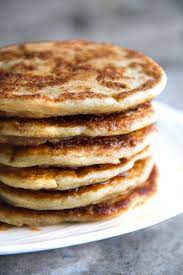Chewy, rich, and slightly sweet, the griddle cakes have a texture not unlike the warm gooey center of a perfect cinnamon roll. Cinnamon Roll Greek Yogurt Pancakes Running With Spoons