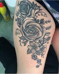 Floral Thigh Tattoo With Roses Bluebells And Leaves Thigh Tattoo Floral Thigh Tattoos Front Thigh Tattoos
