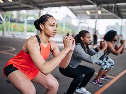 Next, approach the barbell rack and carefully place the bar across. Banded Squats Benefits And 9 Ways To Do Them