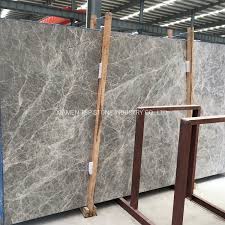 Marble is a very popular natural stone that is quarried and cut into slabs and tiles for a variety of residential and commercial building applications, including countertops, floors, and wall tiles. China Popular Grey Marble Slab For Tile Floor Flooring Paving Wall Bathroom Project China Marble Marble Tile