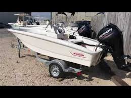 This model was often sold with optional side rails and seat backs. Motor Boat Youtube Videos Boston Whaler Boston 130 Supersport