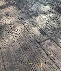 Stamped concrete looks like wood floors. The Foundation Of Decorative Concrete Stamped Concrete Concrete Decor