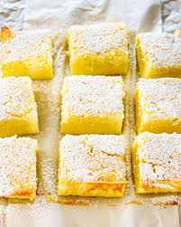 Pierce the yolks and cover with another sheet of pastry. Lemon Magic Cake Jo Cooks