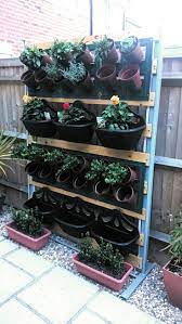 Wall Garden From An Old Bed Frame Vertical Garden Diy Wall Garden Old Bed Frames