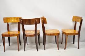 The classic lines and nail head trim on the chairs along with the lift mechanism that allows them to adjust to different heights and swivels, make them elegant and practical. Vintage Italian Sorrento Inlaid Wood Game Table Dining Chairs Set Of 4 For Sale At 1stdibs