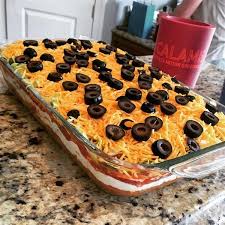 · make easy guacamole, spread over bean layer: Seven Layer Taco Dip This Recipe Is Very Good As Is But Is Also Easy To Alter To Personal Taste Layered Dip Recipes Layered Taco Dip Taco Dip Recipe