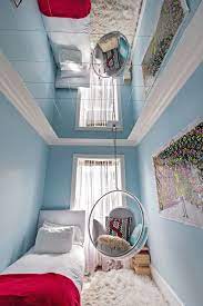 Mirrors on the ceiling are part of that. Upper West Side Brownstone With Modern Twists Published 2014 Mirror Ceiling Ceiling Design Bedroom Narrow Rooms