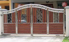With these designs we can. Here Is Another Amazing Design Of Front Gate The Two Materials Are Combined In A Beautiful Way The Shiny Steel Main Gate Design Iron Gate Design Modern Gate