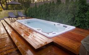 This should definitely be an exclusive side door entrance that can only be accessed through the spa, but in no way should be open and visible while in the spa. Swim Spa Installation Ideas Brady S Pool Spa