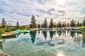 Man Made Lake Swimming Pool Lake Swimming Pool Swimming Pools Landscape