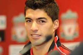 Controversial Liverpool striker Luis Suarez could return from his 10 game ban in the Reds third round Capital One Cup game at Manchester United - luis-suarez-689350578-3265664