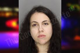 Courtney Davis: https://thegeorgiagazette.com/cobb/courtney-davis-18/