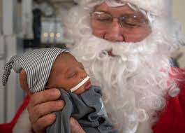 Santa visits babies at Helen DeVos Children's Hospital NICU