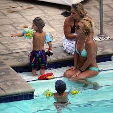A dip in the pool, and britney even. Pin On Britney Spears