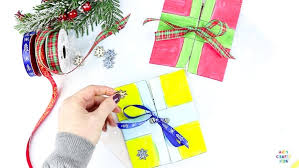 Making a christmas card is a fun and entertaining activity with an emphasis on creating a keepsake with sentimental value. Easy Present Printable Christmas Cards Arty Crafty Kids