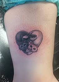 Small and cute anchor tattooed on ankles. Two Small Cute Cats Ankle Tattoo Tattooimages Biz