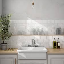 Learn tile ideas for small bathrooms, plus facts about ceramic, porcelain tip: Brick Blanco White Tileflair