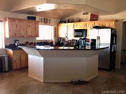 The lower side will be a 30 height table. Before And After Diy Kitchen Island Makeover Addicted 2 Diy
