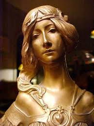 Aurore", Silver-plated bronze medallion with female bust Designed by George  Flamand. 1900 Lalique Museum