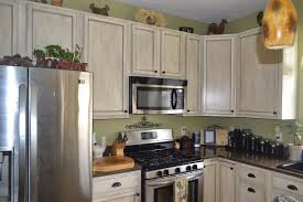 I wish i could say it has held up nicely. Thrifty Artsy Girl White Glazed Cabinet Transformations A Review A Year Later